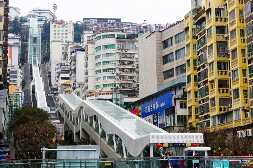 China Built the World’s Largest Outdoor Escalator, and It’s a Modern Marvel That Looks Like It Never Stops Rising Into the Sky