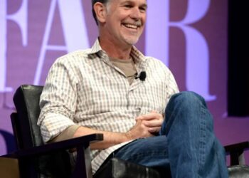 Netflix cofounder Reed Hastings says his first boss out of college washed his coffee cups at 4:30 a.m.