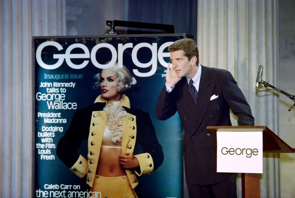 John F. Kennedy Jr. at a press conference announcing the launch of 