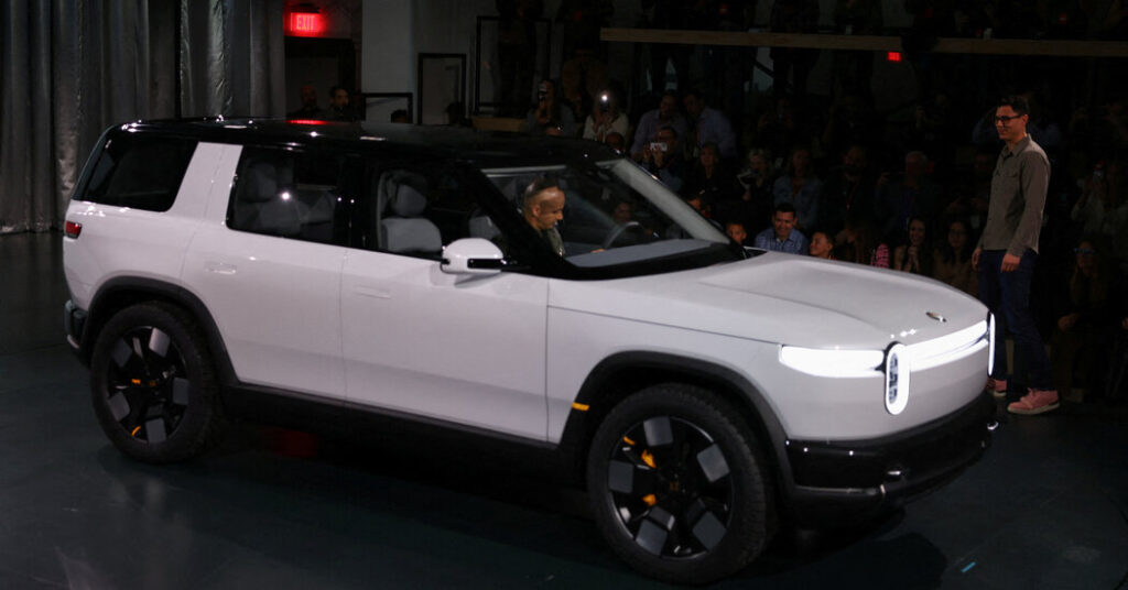 Uber to Buy Rivian Vehicles for Use as Driverless Taxis