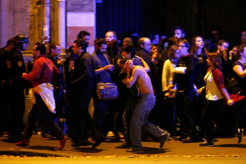 People are evacuated from the Bataclan theatre in Paris, France.