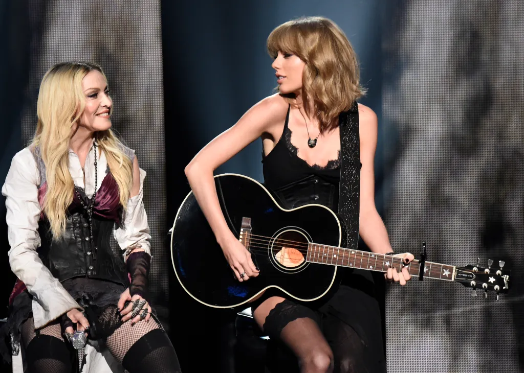 Taylor Swift performs with Madonna