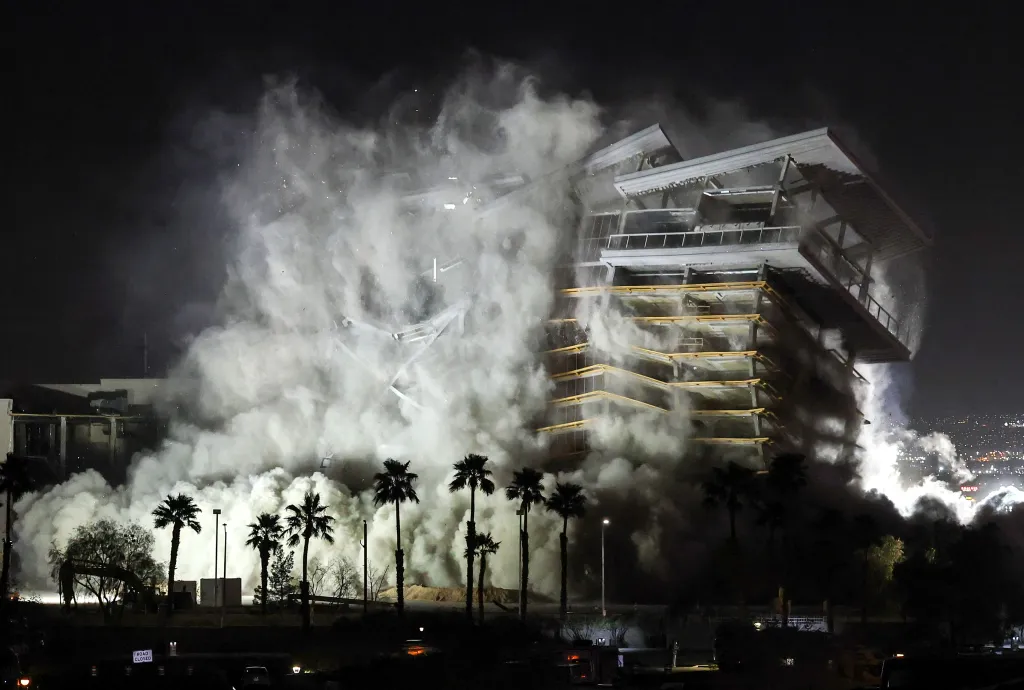 Eastside Cannery Casino and Hotel demolished by implosion at night.