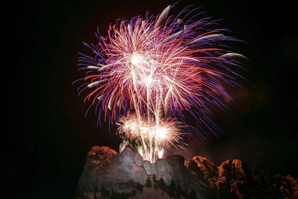 Fireworks explode above Mount Rushmore National Memorial.