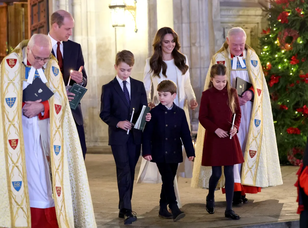 The Prince and Princess of Wales with their children and two clergymen leaving the 