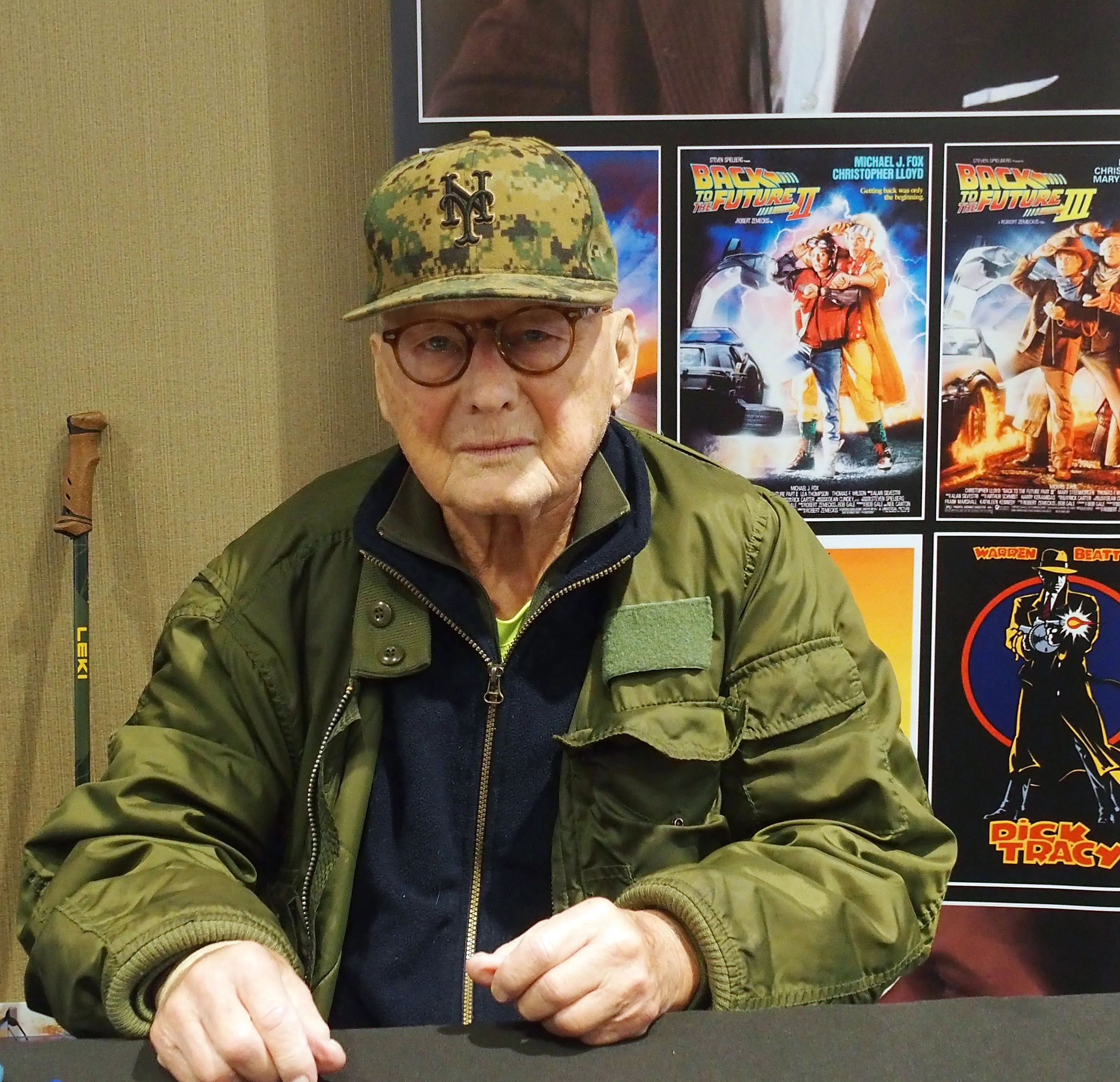 James Tolkan in a green jacket and camouflage hat at the Chiller Theatre Expo.