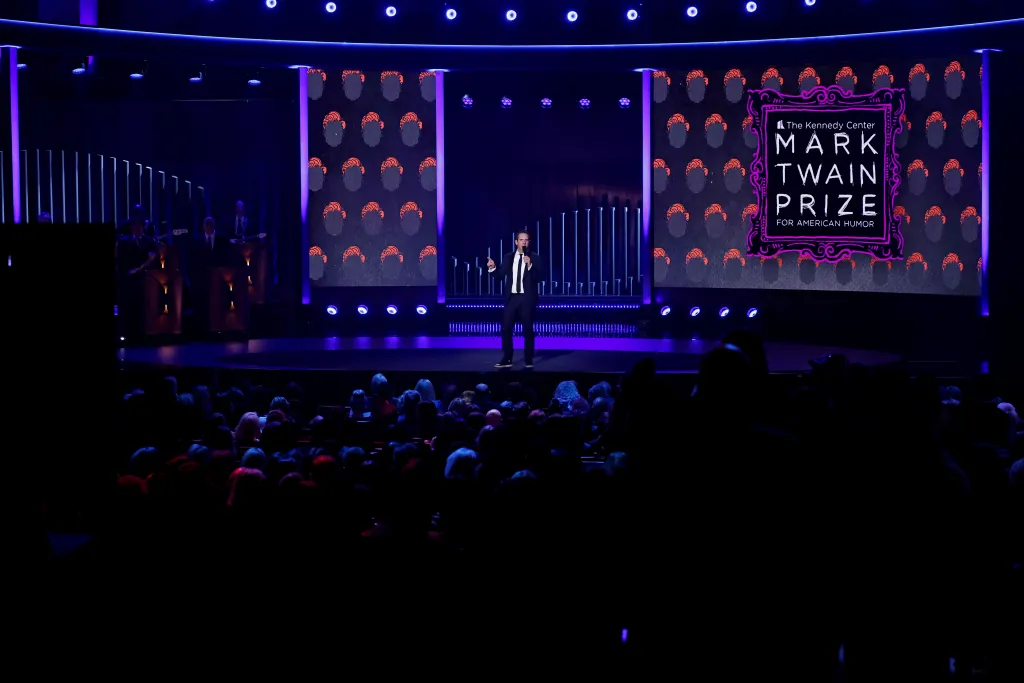 Seth Herzog performing on stage at the 2025 Mark Twain Prize For American Humor.