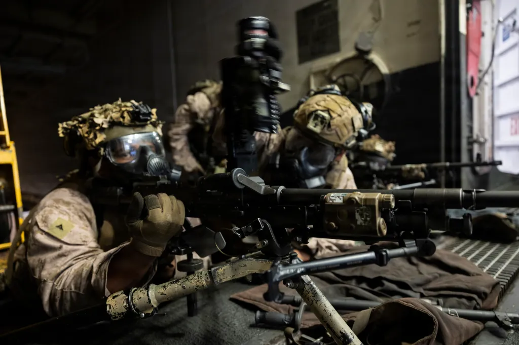 U.S. Marines train with M240B machine guns on the USS Boxer.