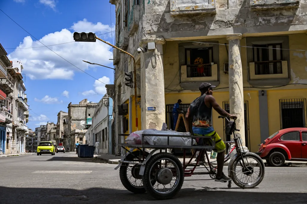 Man on a tricycle in Havana during a blackout.