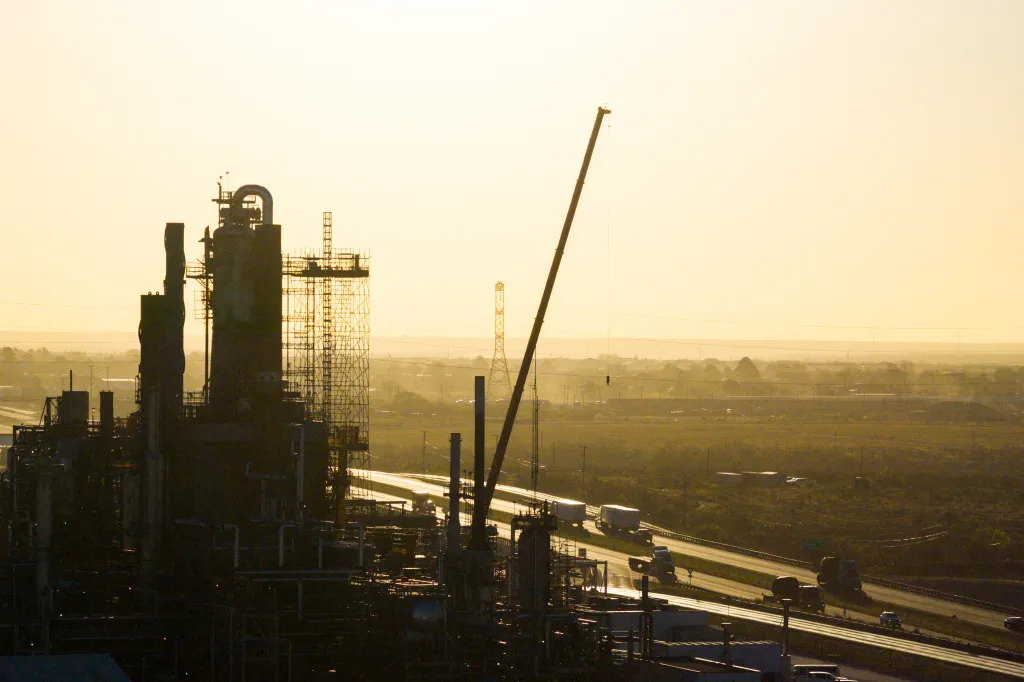 Aerial view of the Big Spring Refinery in Big Spring, Texas, with a highway alongside.
