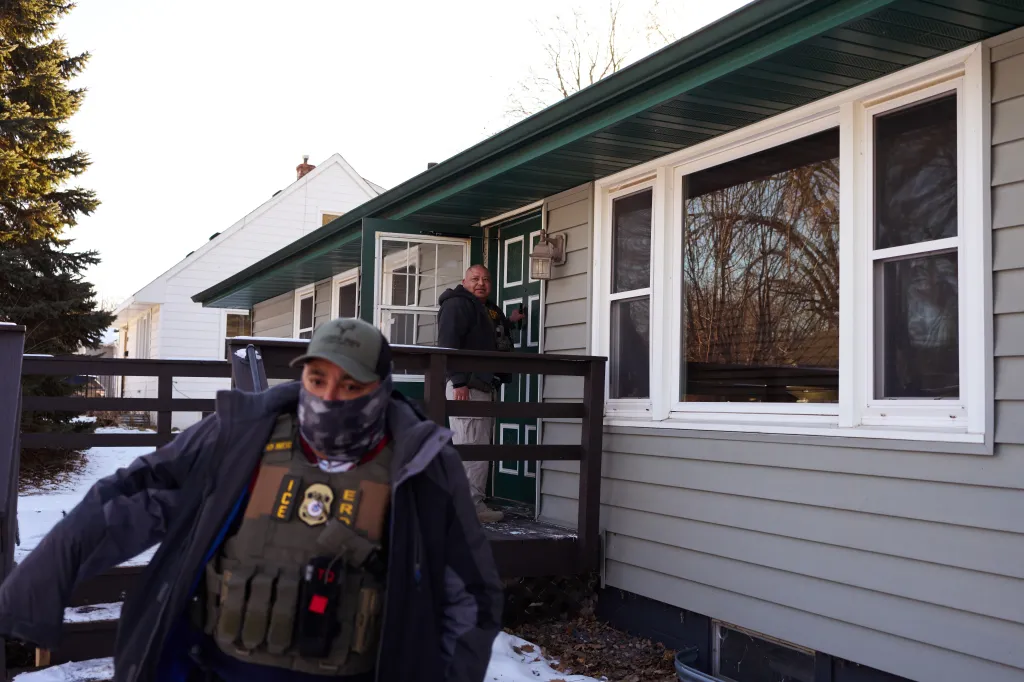 ICE agents knock on the door of a home they suspect an illegal immigrant fled into on Jan. 28, 2026.