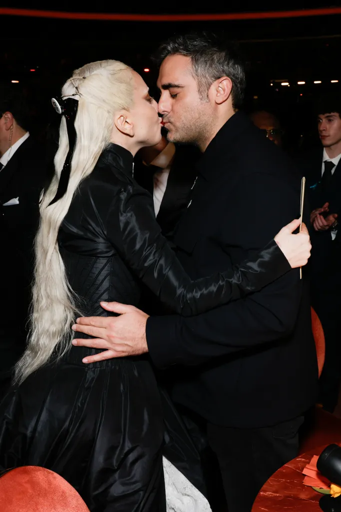 Lady Gaga and Michael Polansky kissing at the 68th Annual Grammy Awards.