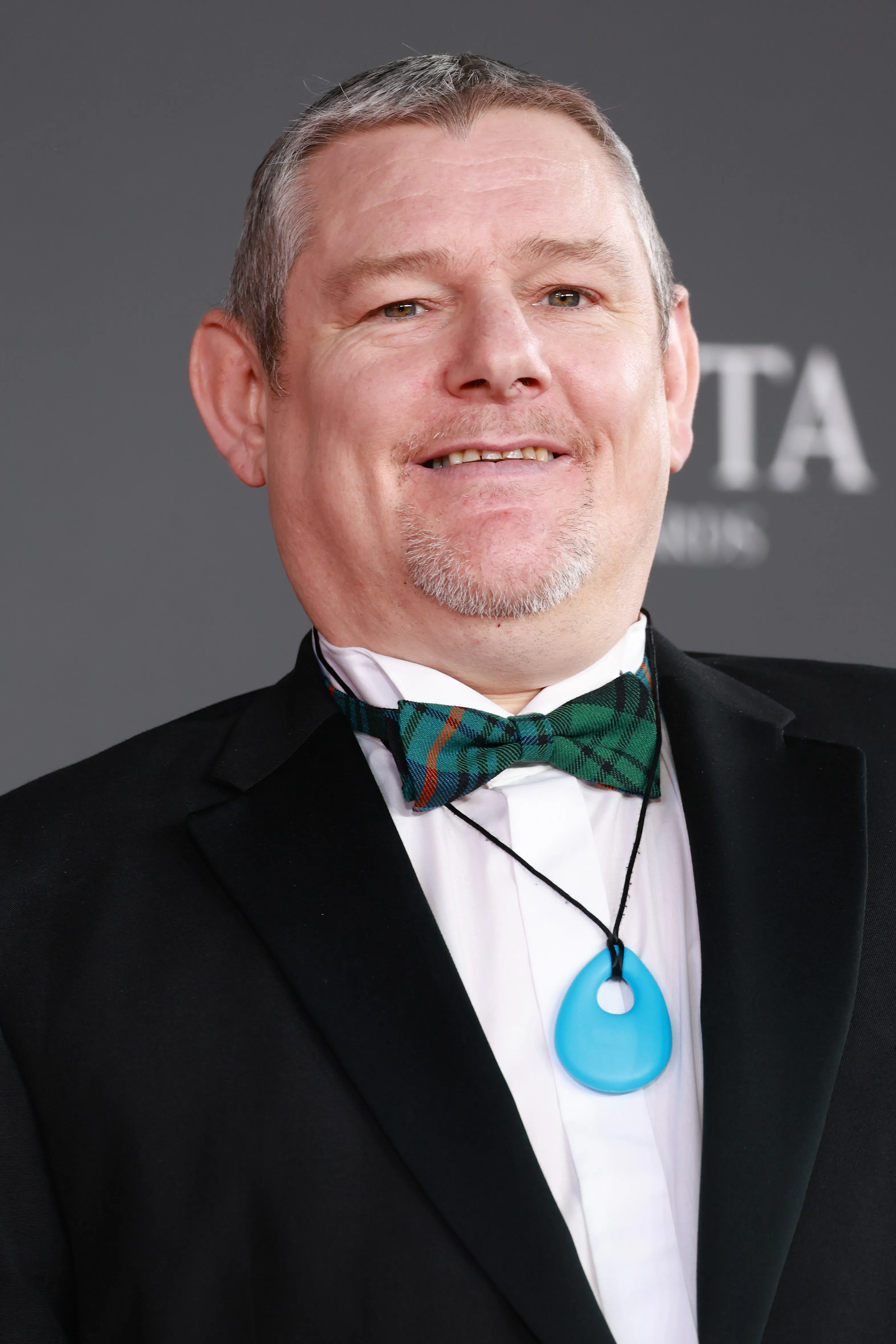 John Davidson at the 2026 EE BAFTA Film Awards.