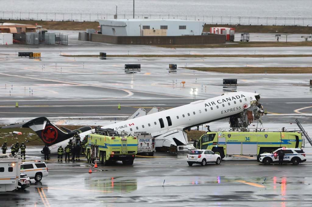 Air Canada Express plane after colliding with a Port Authority fire truck at LaGuardia Airport.