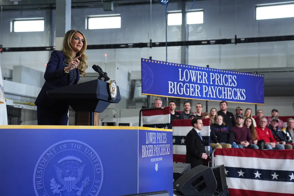 U.S. Administrator of the Small Business Administration Kelly Loeffler speaking at a podium with the Presidential seal.