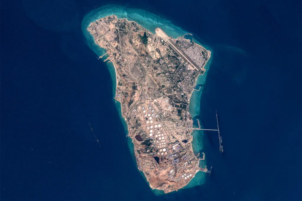 Satellite image of Iran's Kharg Island, showing oil storage tanks, infrastructure, and an airport.