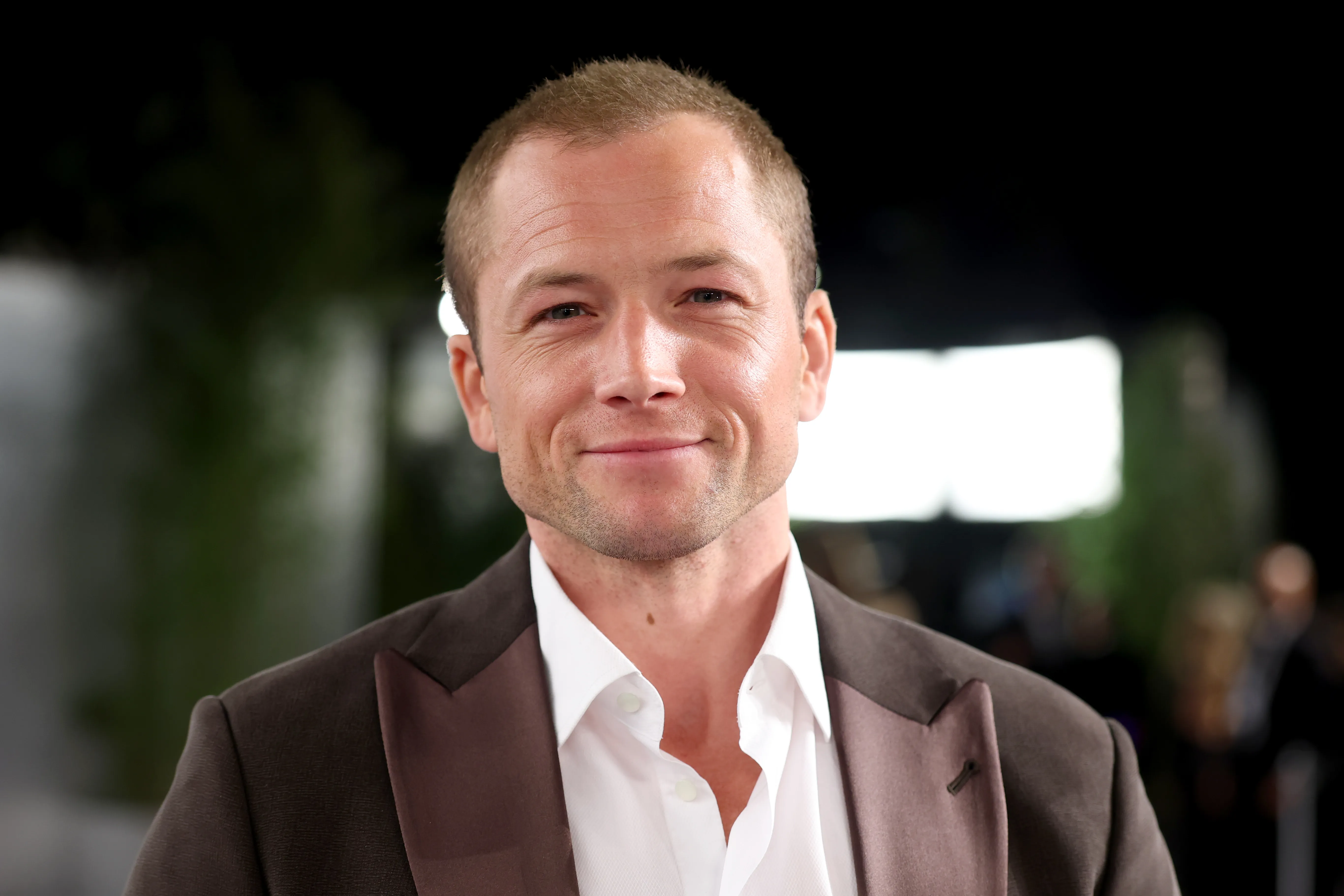 Taron Egerton, Brooks Nader 