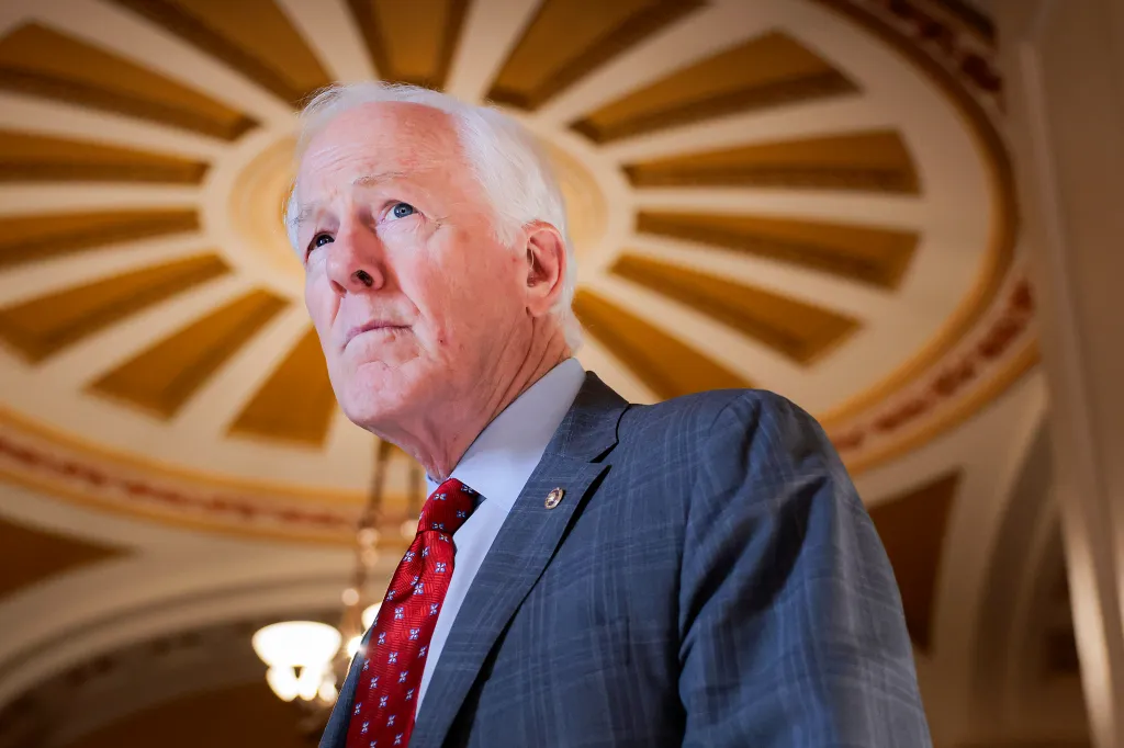 U.S. Sen. John Cornyn (R-TX) speaks with a reporter at the U.S. Capitol.