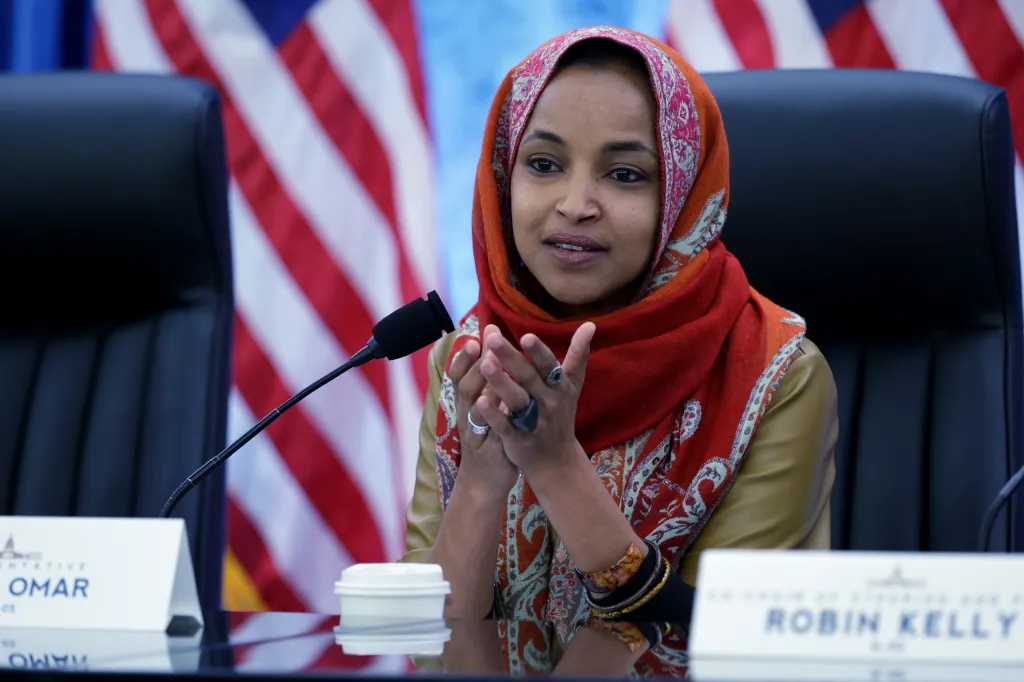 Ilhan Omar speaking at a Capitol Hill hearing.