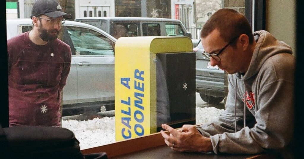 A ‘Zoomer-to-Boomer’ Pay Phone Hotline Gets Two Generations Chatting