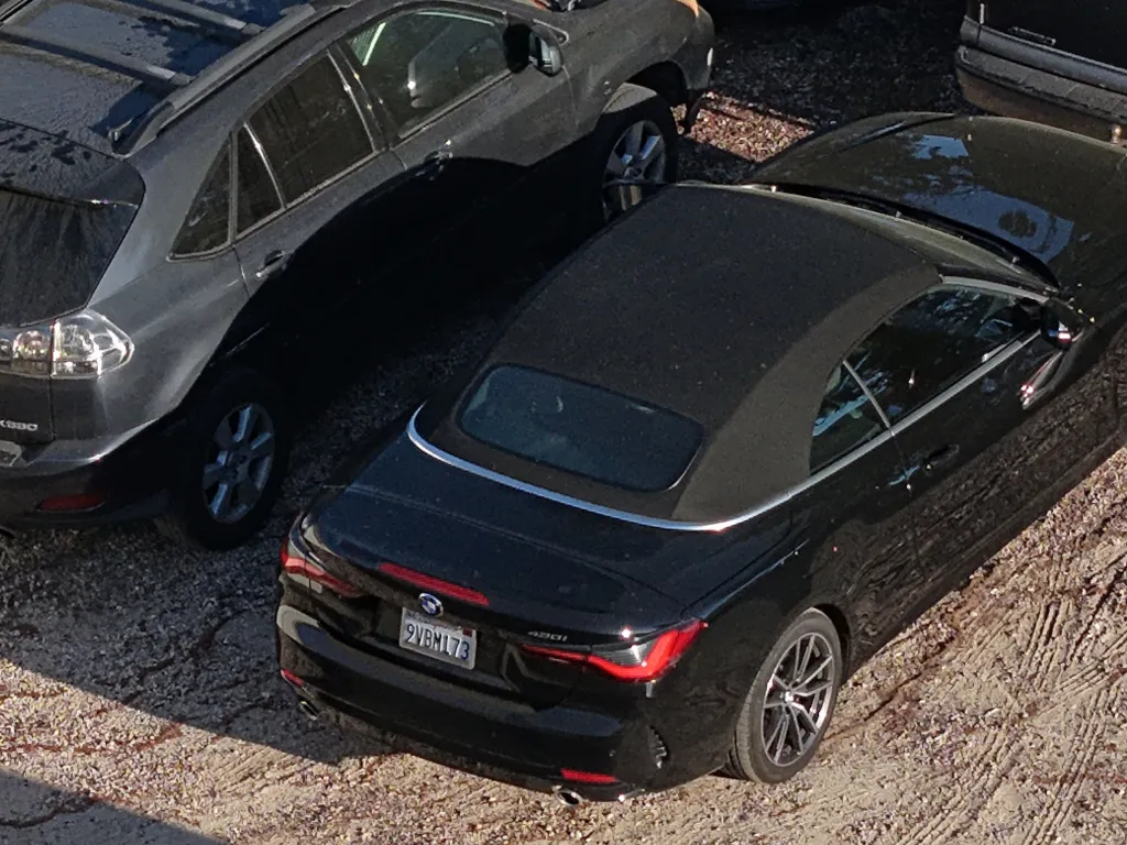 Overhead view of a black BMW convertible, identified as the car Britney Spears was driving during her DUI arrest, parked at Roy's Towing.