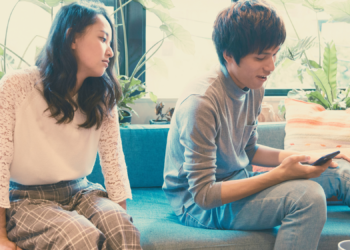 4 Reasons Your Partner Always Puts Their Phone Face-Down (Relax, It’s Not That)