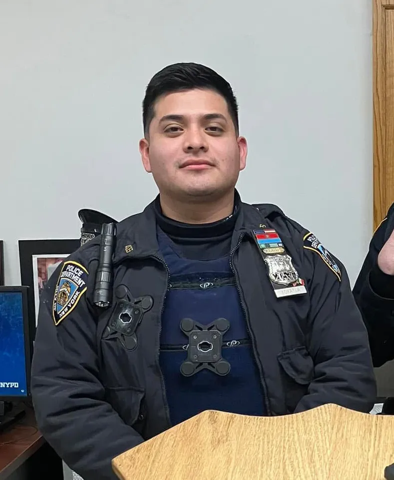 Officer Erick M. Xoyatlacebada in uniform with badges and equipment.