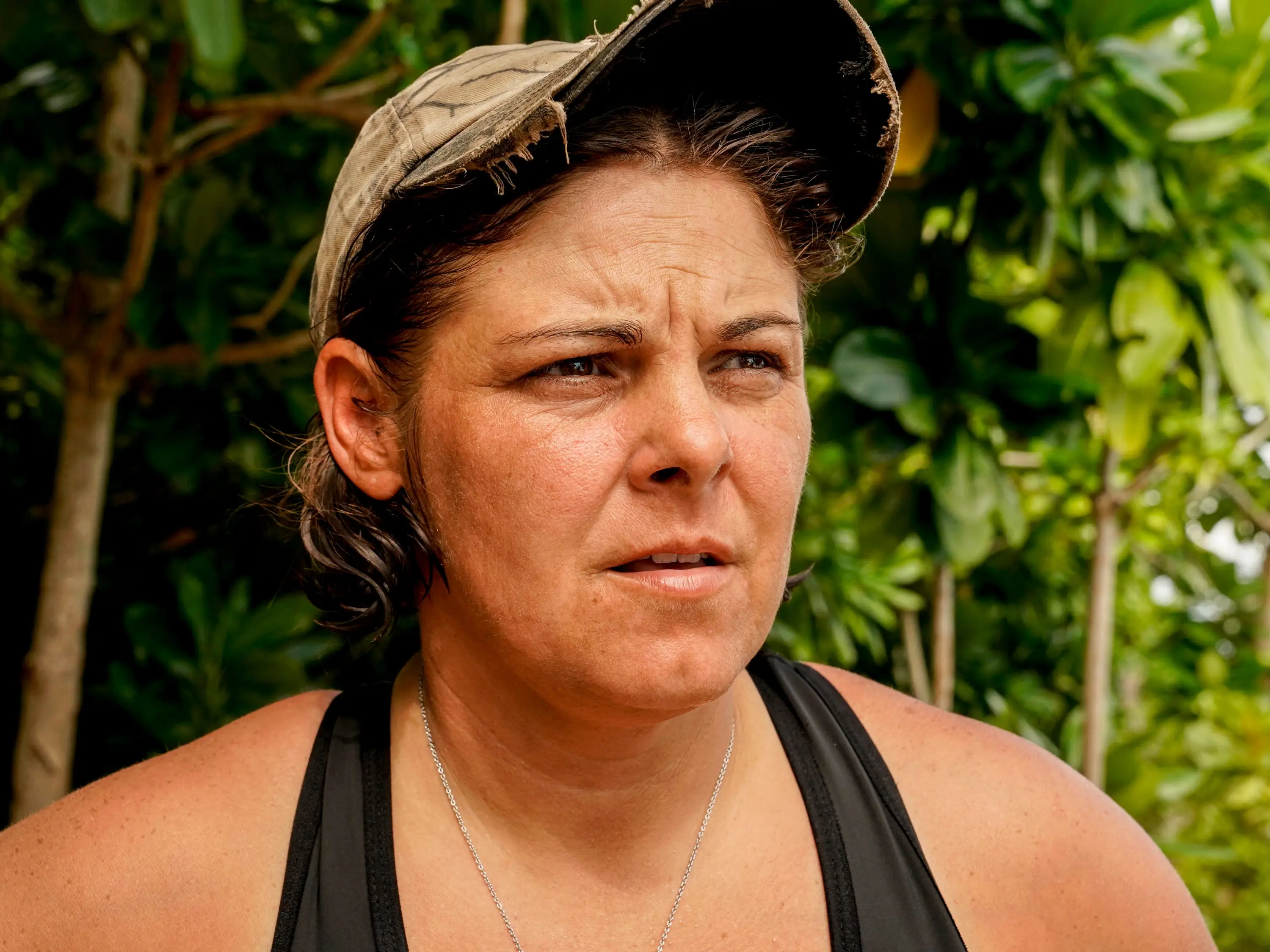 Elaine Stott looking pensive in a closeup on Survivor