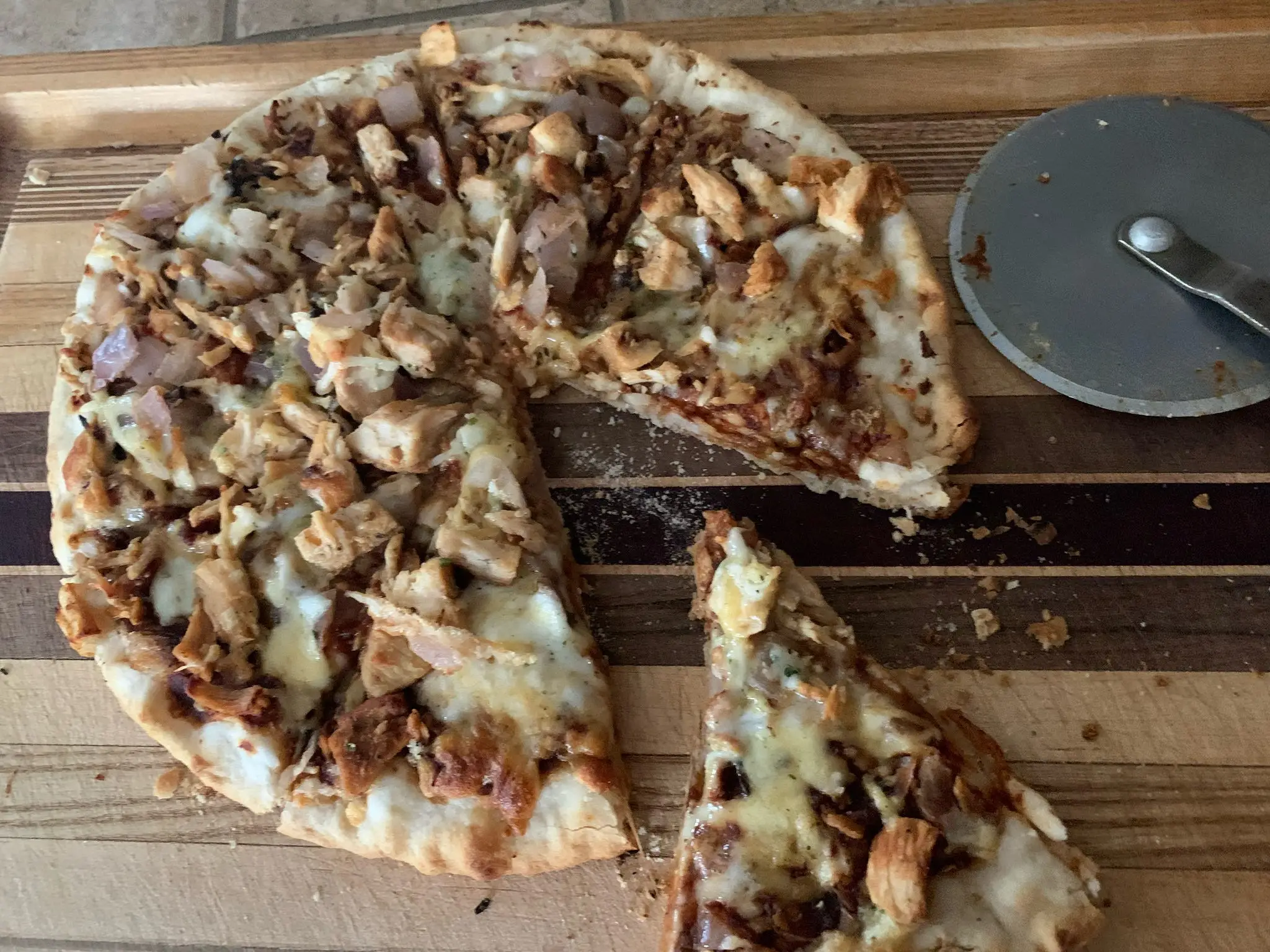 cooked and sliced Trader Joe's barbecue chicken pizza