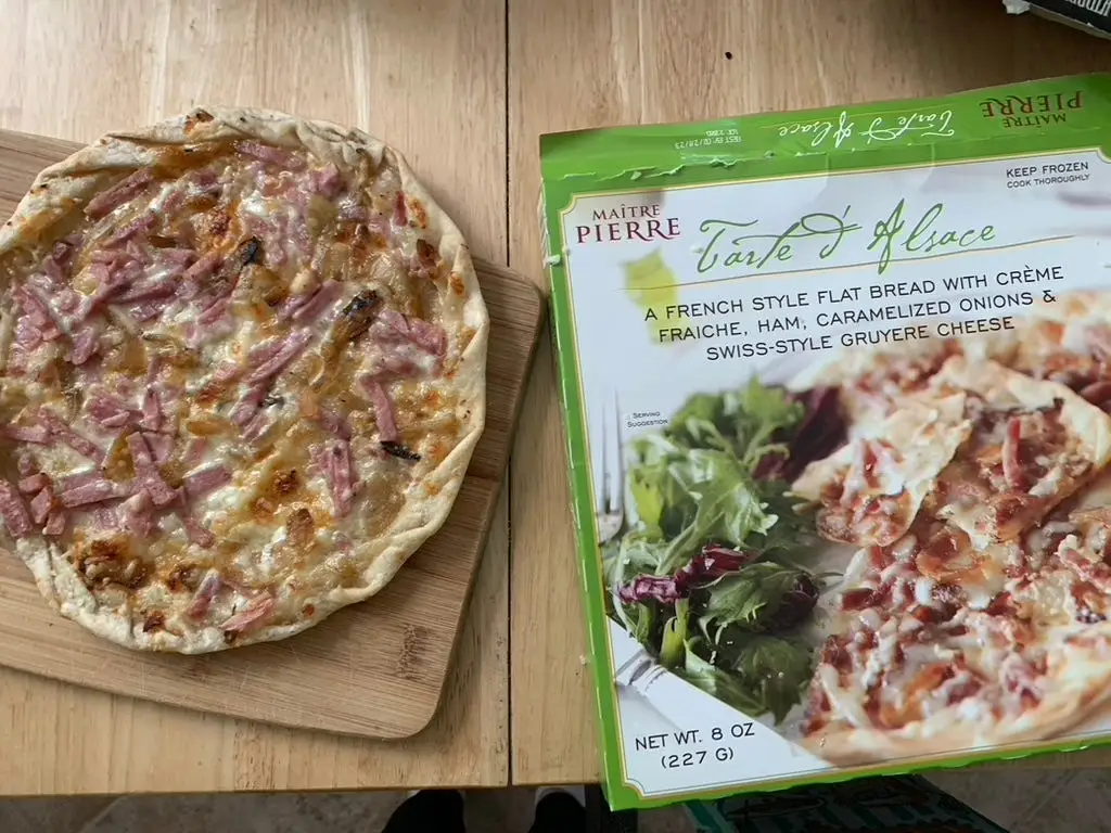 Trader Joe's tarte d’alsace  beside green and white box