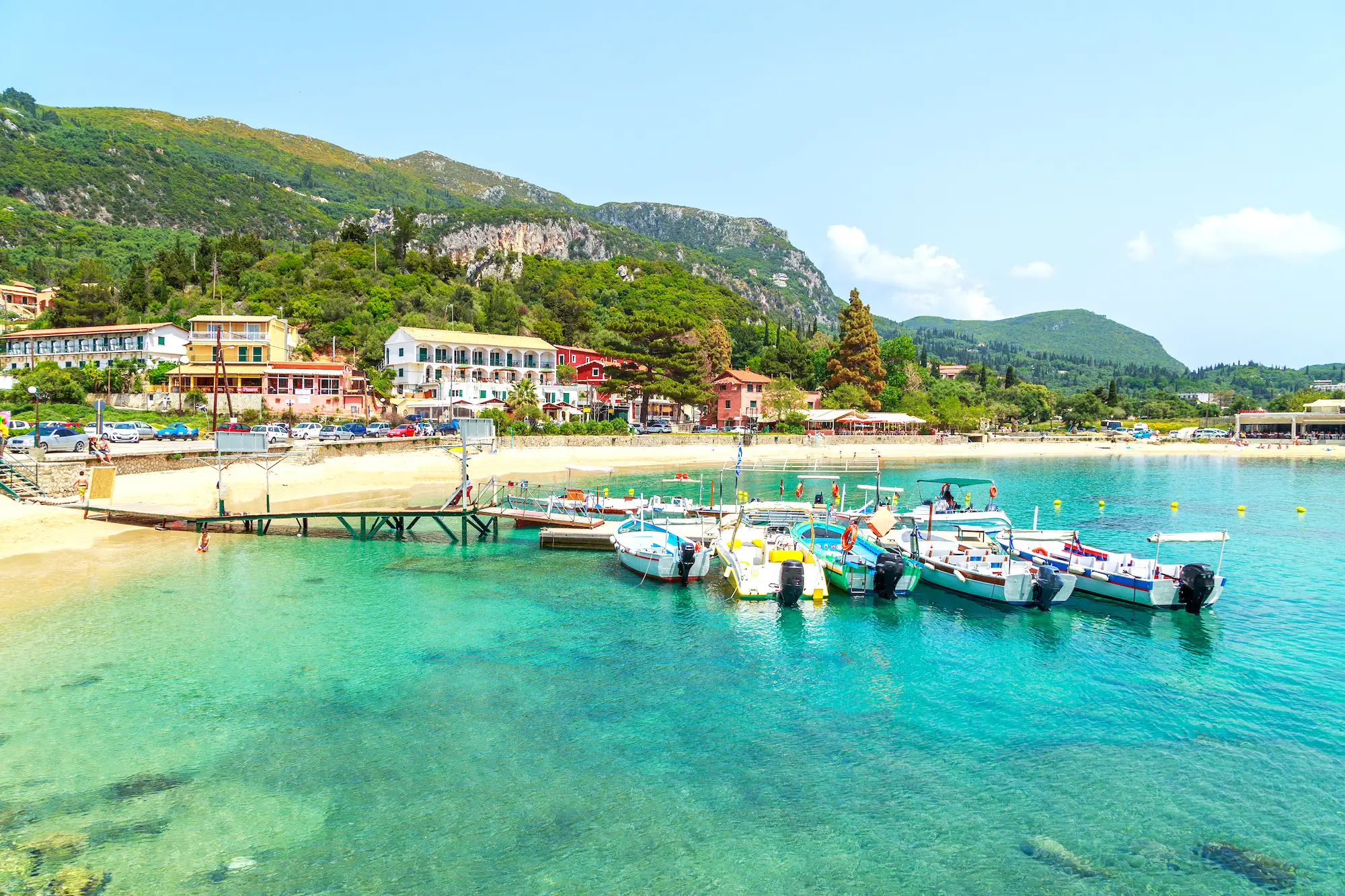 Boats docked at a beach in Corfu