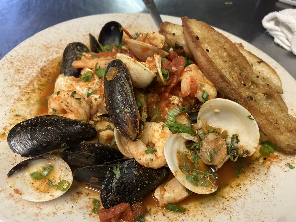Plate of clams and shrimp.