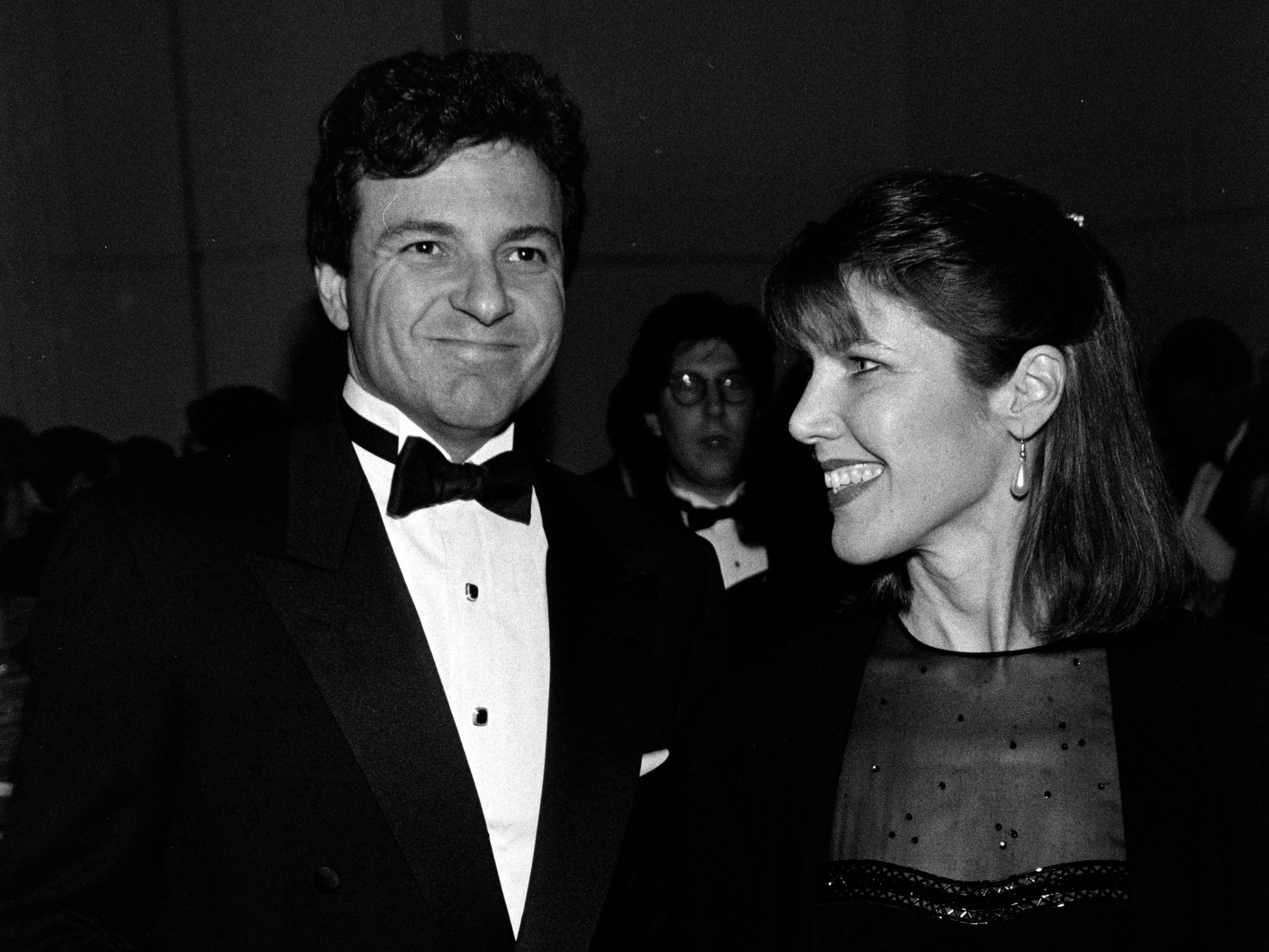 A black and white photo of Robert Iger and Kathleen Susan attending a black-tie event at the Beverly Hilton Hotel in Beverly Hills, California, on March 10, 1993.