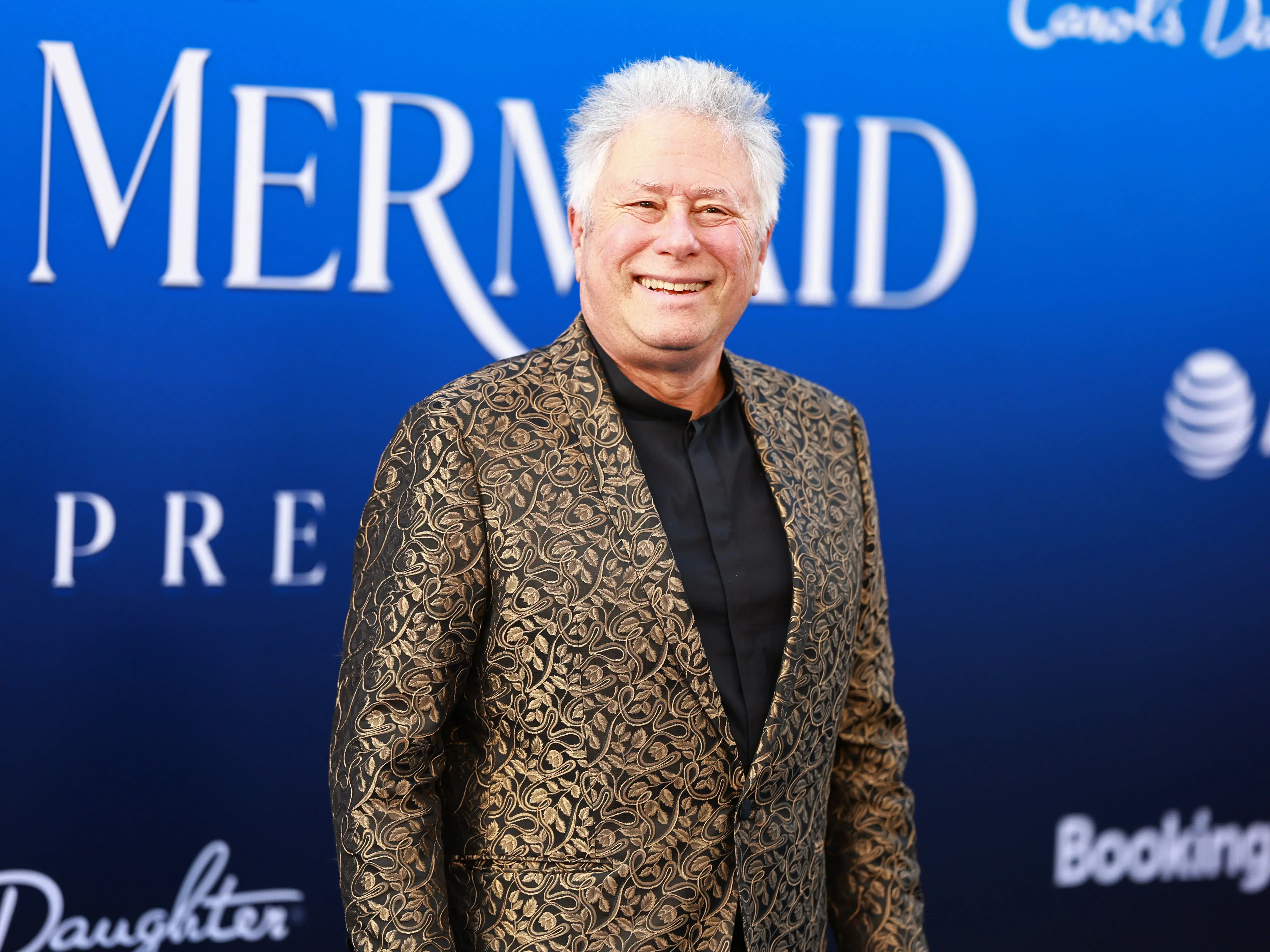 Alan Menken attending the world premiere of the live-action version of 