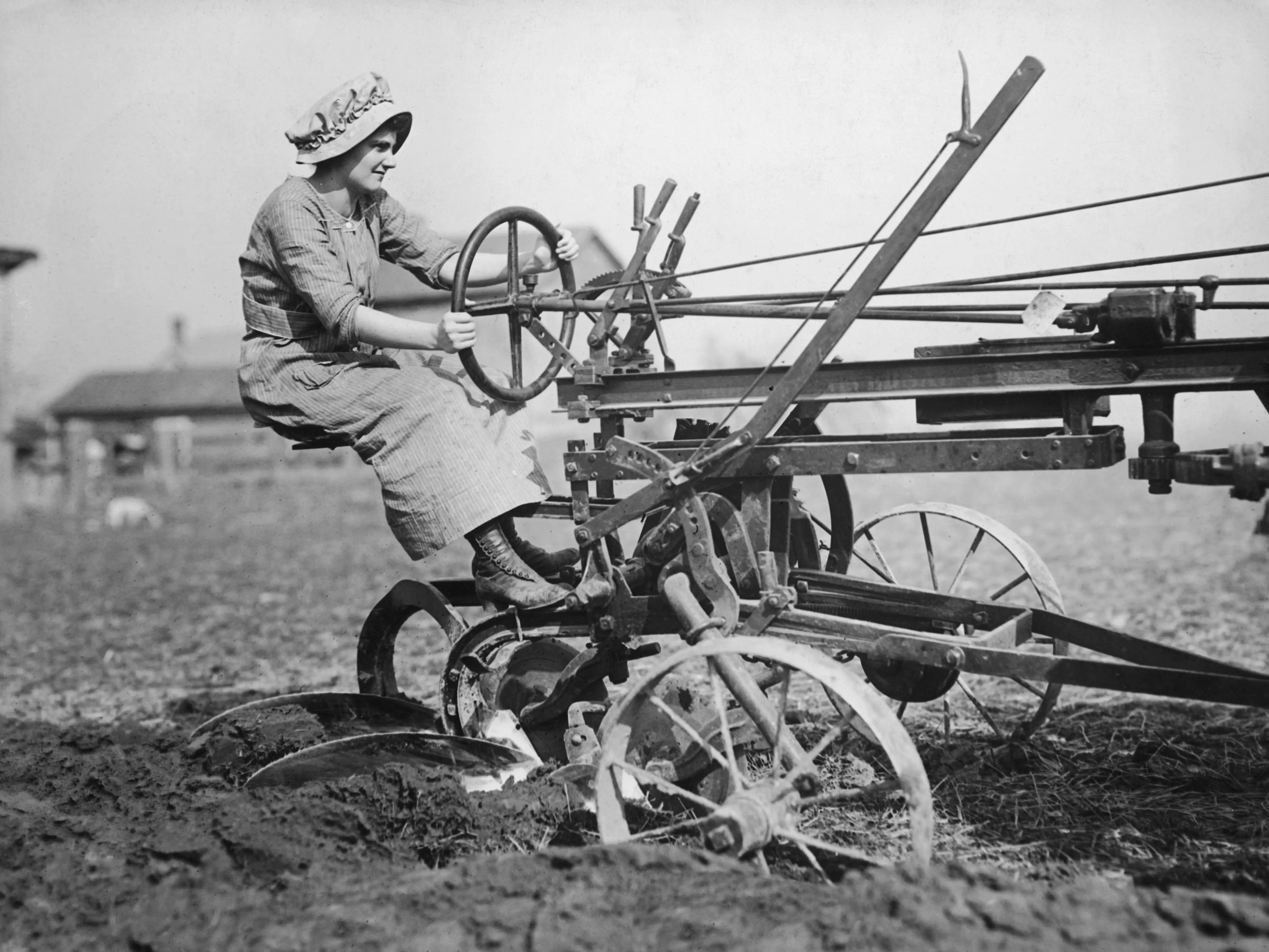 A woman operating a plough in 1925.