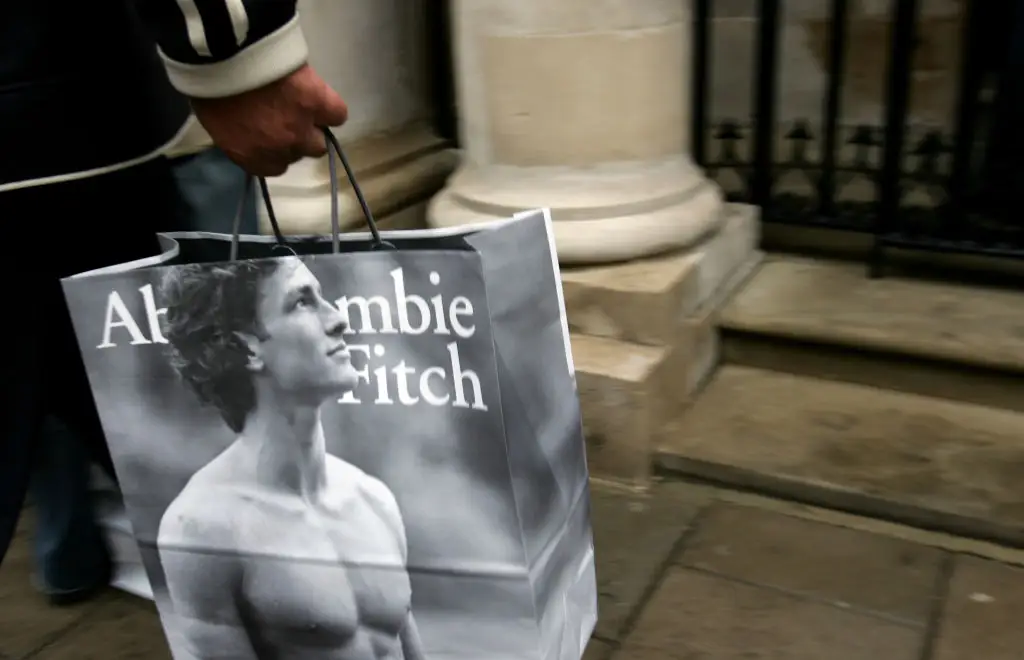 Abercrombie and Fitch bag with shirtless man