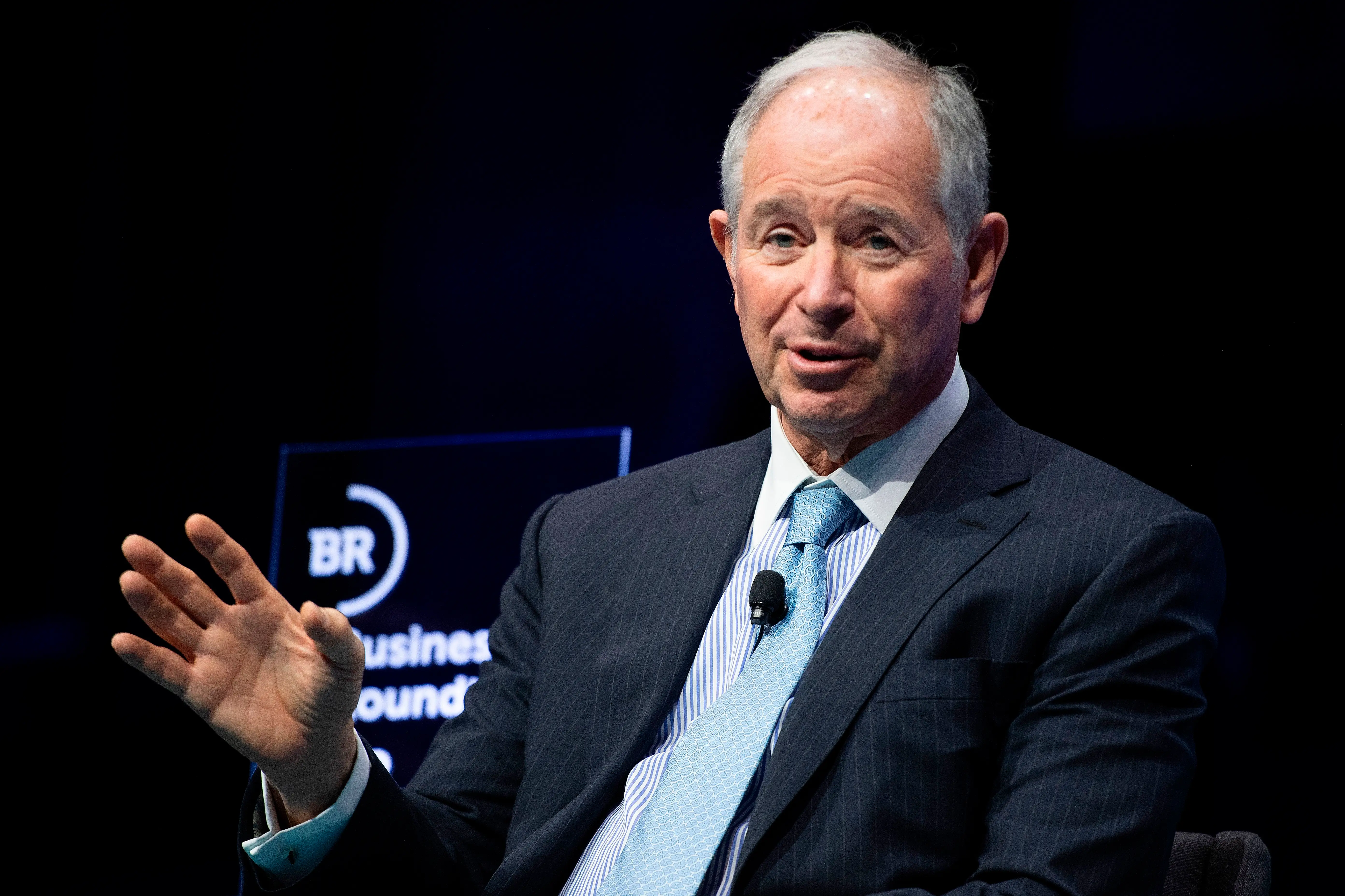 Blackstone CEO Steve Schwarzman speaks and holds out his hand in a gesture during the Business Roundtable CEO Innovation Summit in Washington, DC on December 6, 2018.