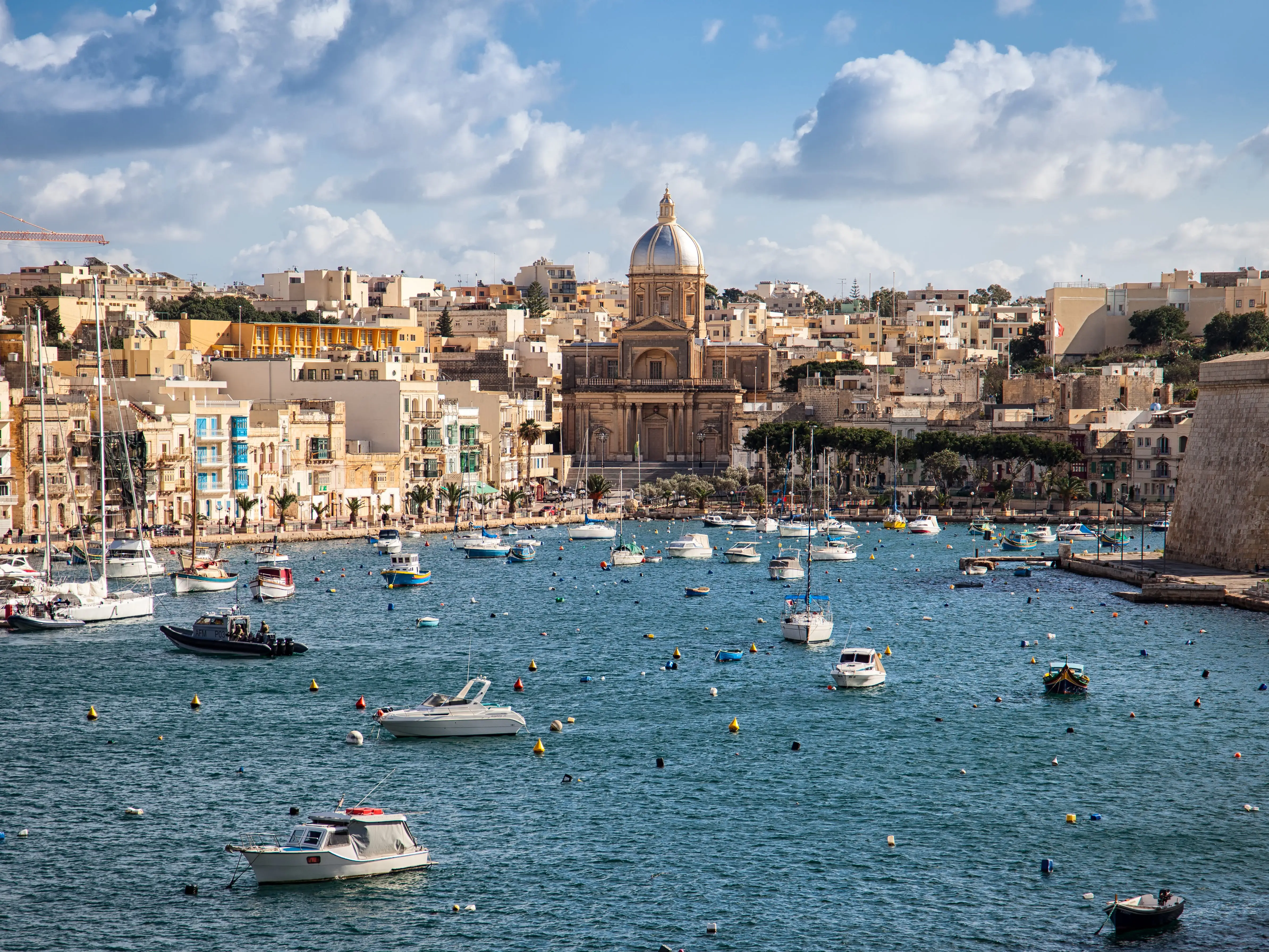 Sailing boats on Senglea marina in Grand Bay, Valetta, Malta