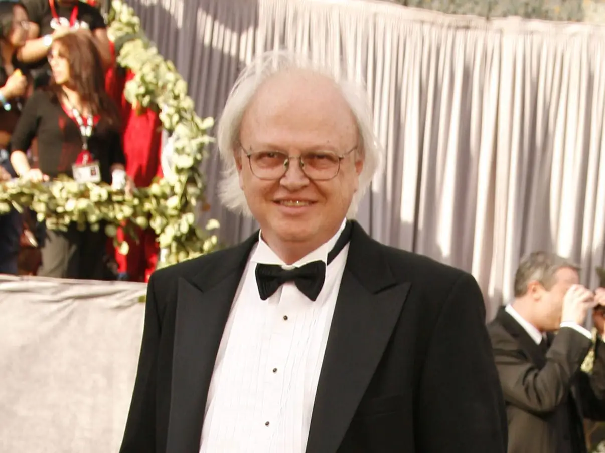 Dennis Muren posed on the red carpet at the 78th annual Academy Awards.