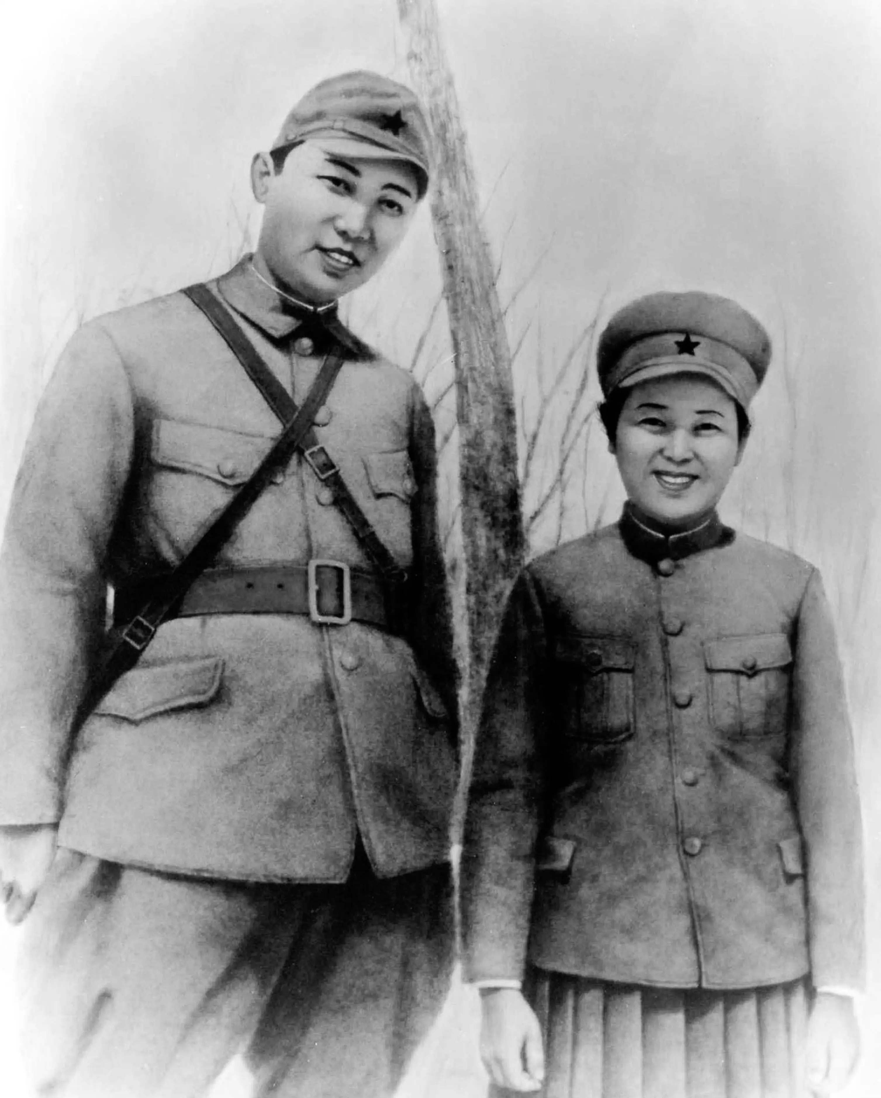 Kim Il Sung and Kim Jong Suk in military uniforms