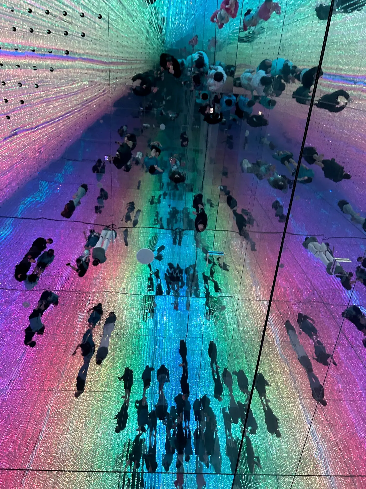 A reflection in the rainbow room of TeamLab Tokyo