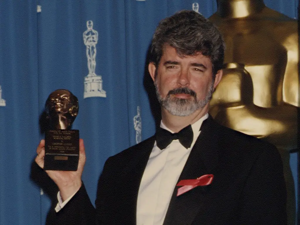 George Lucas holds Irving G. Thalberg Memorial Award at the 64th Annual Academy Awards