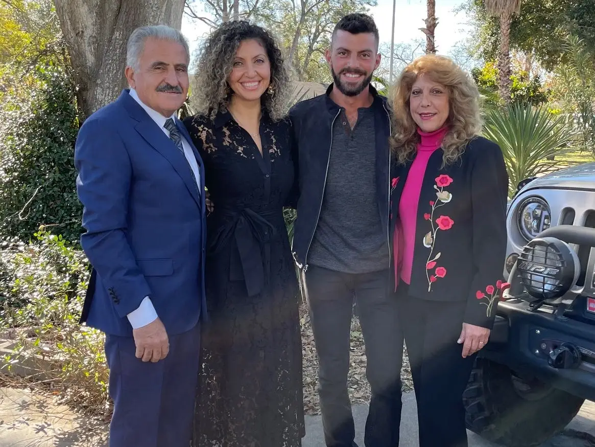 Family posing for photo