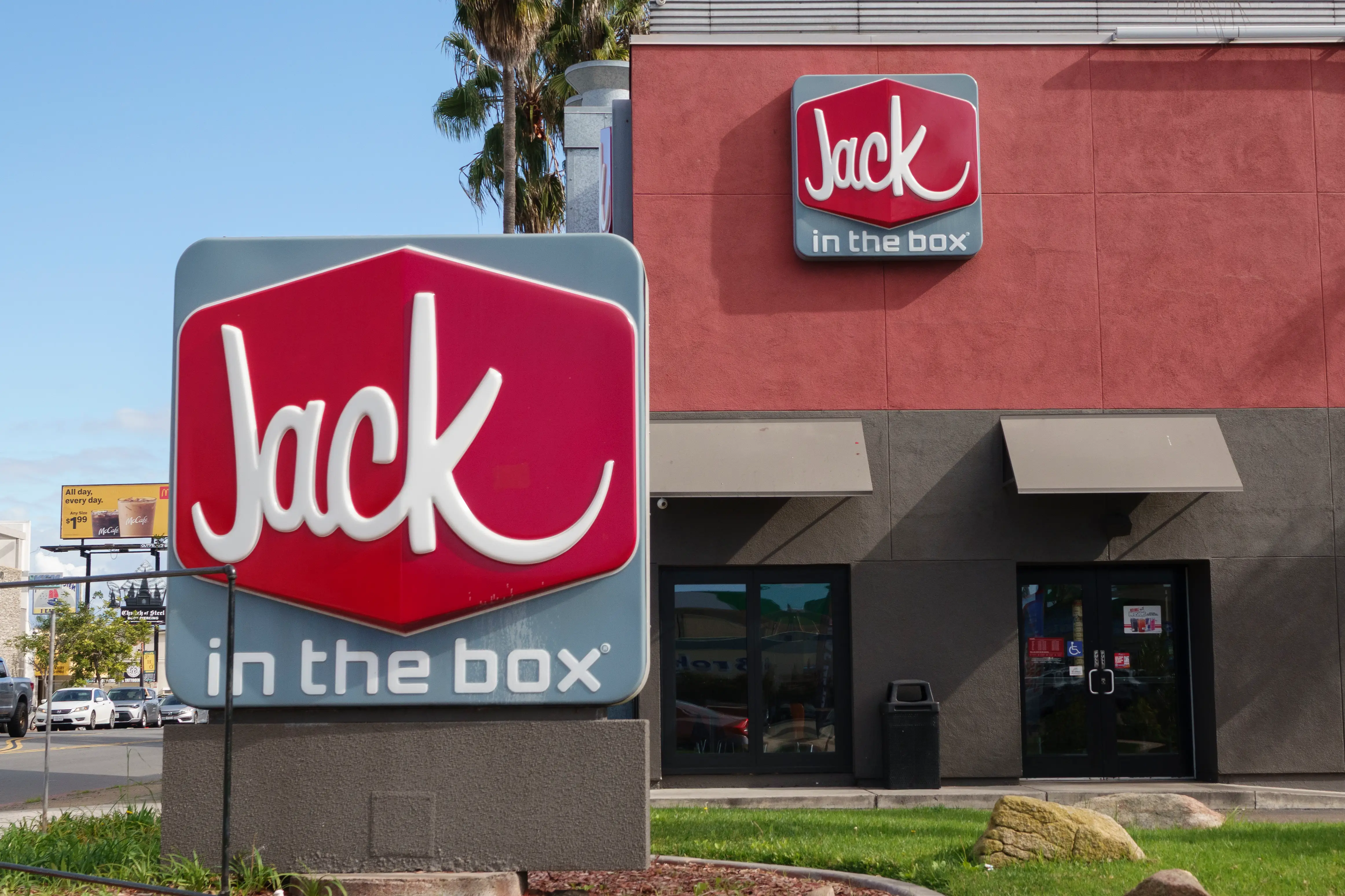 Here's a Jack in the Box logo displayed on a sign outside a restaurant on January 9, 2026, in San Diego, CA.