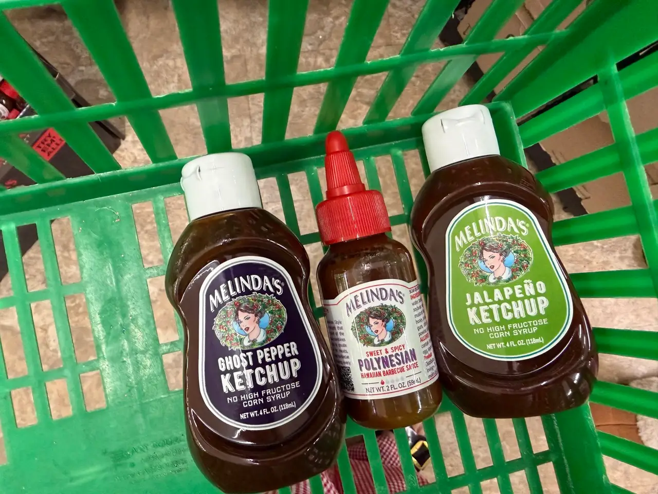 Condiments in green basket at Dollar Tree