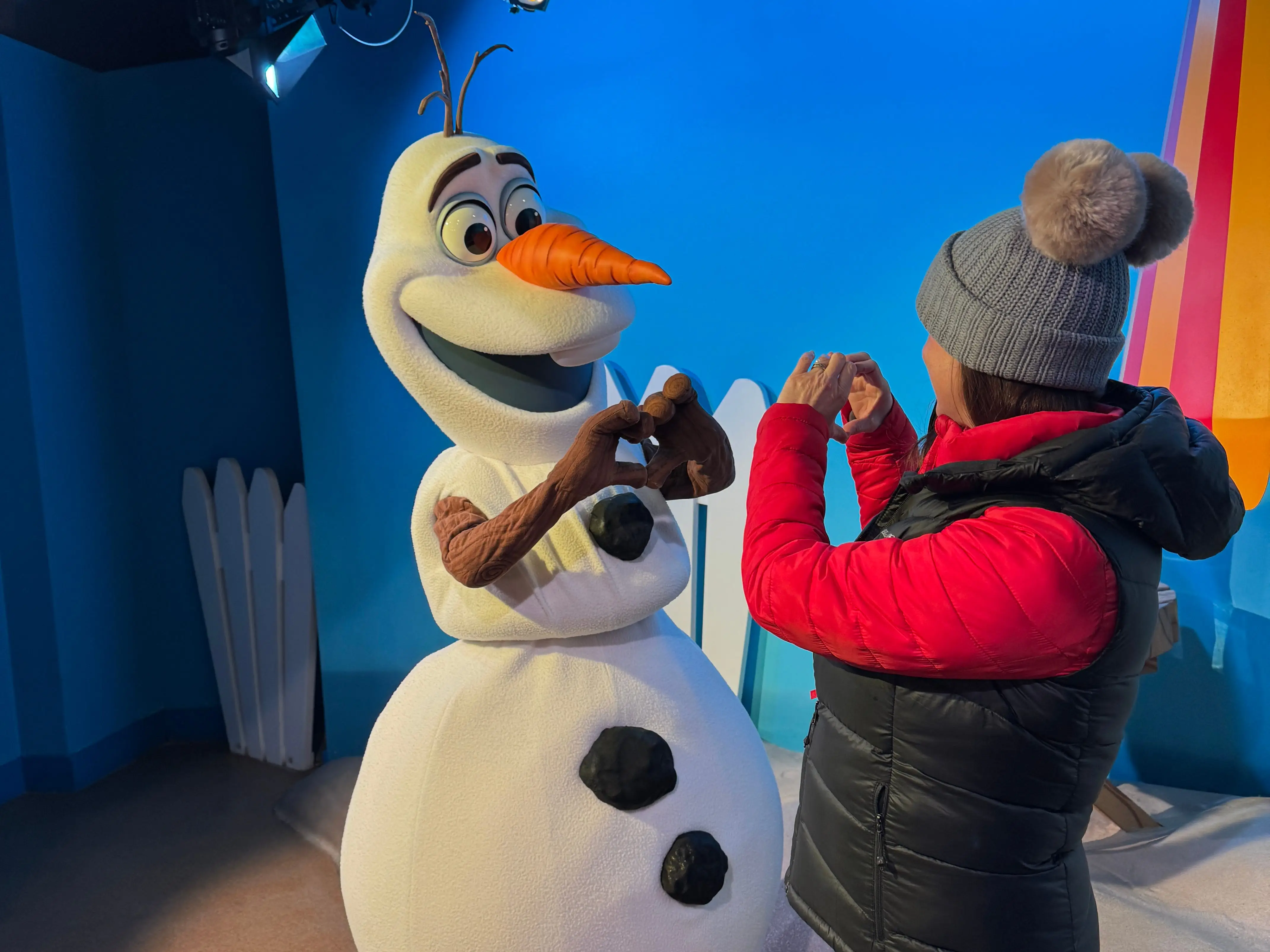 Woman with Olaf in Disney
