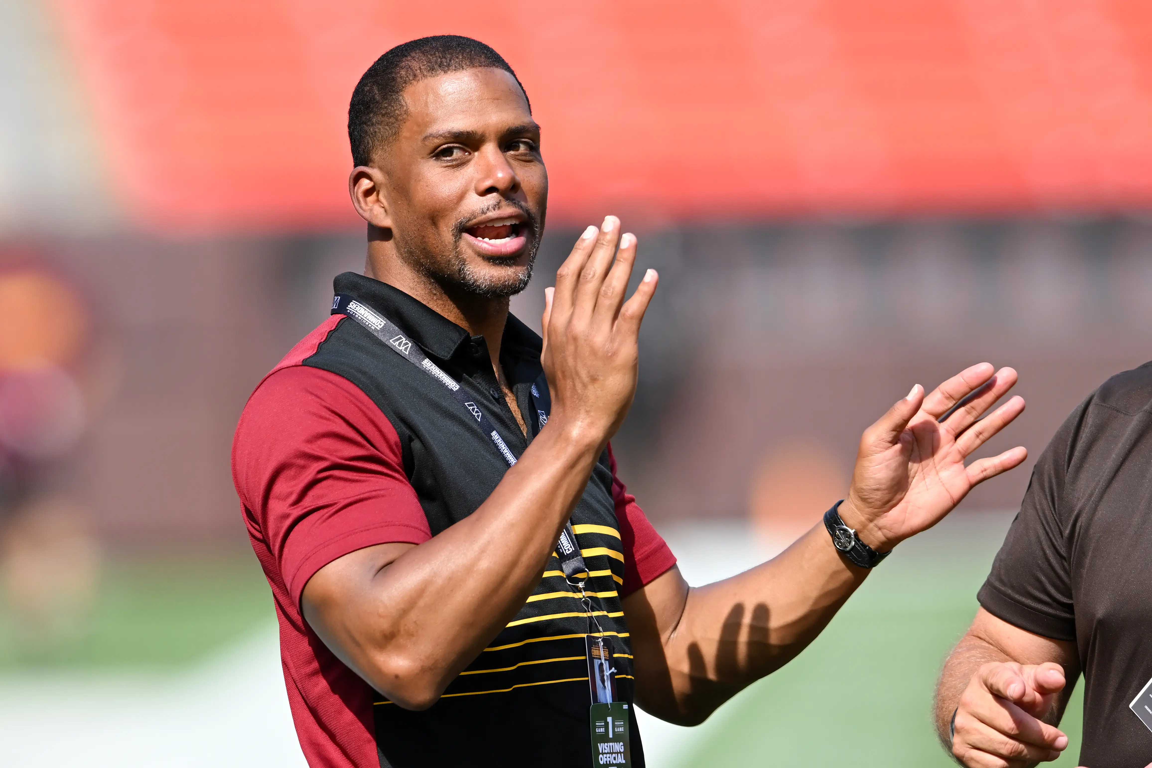 Jason Wright, former CEO of the NFL's Washington Commanders, on the field.