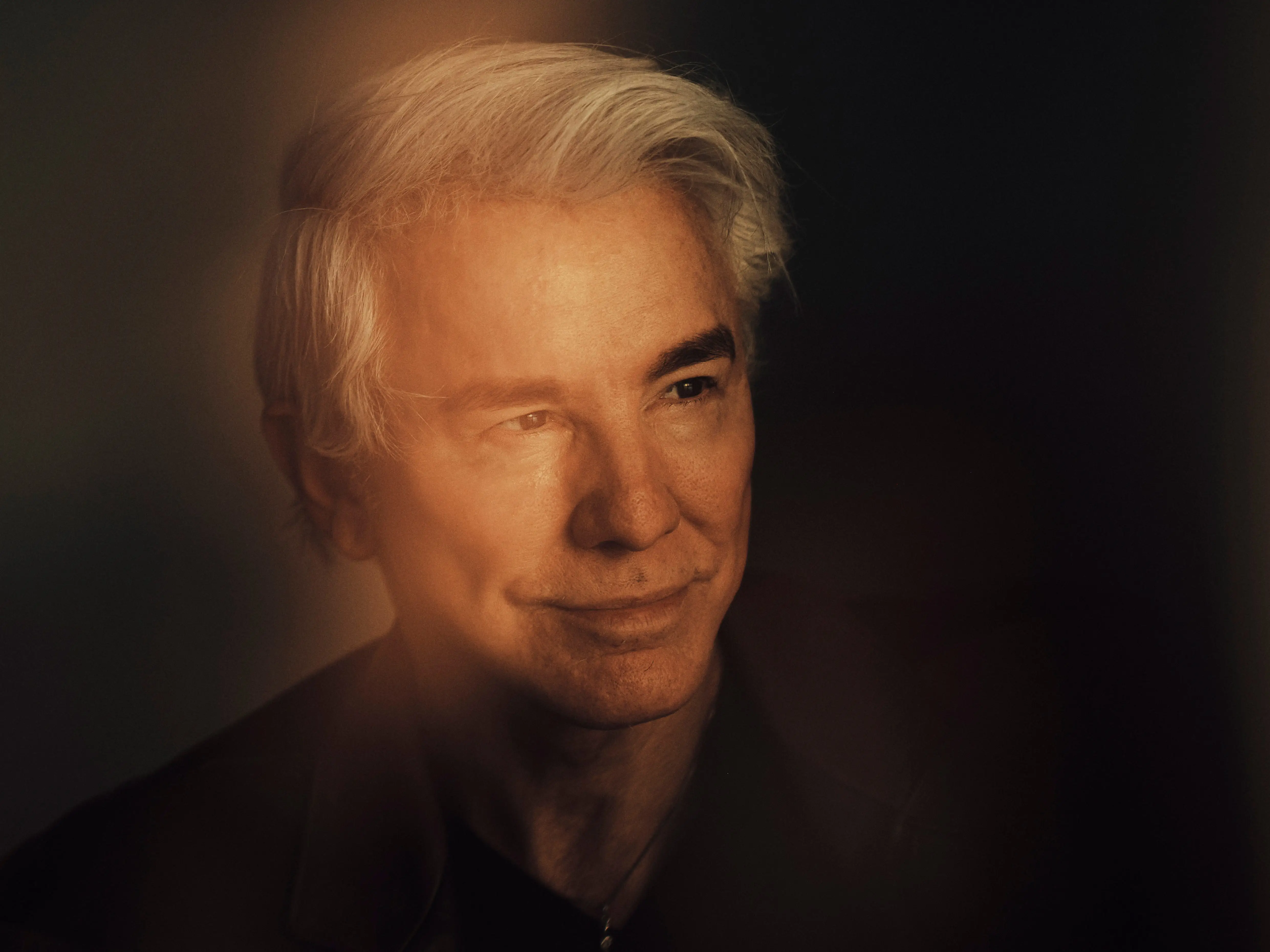 Baz Luhrmann smiling