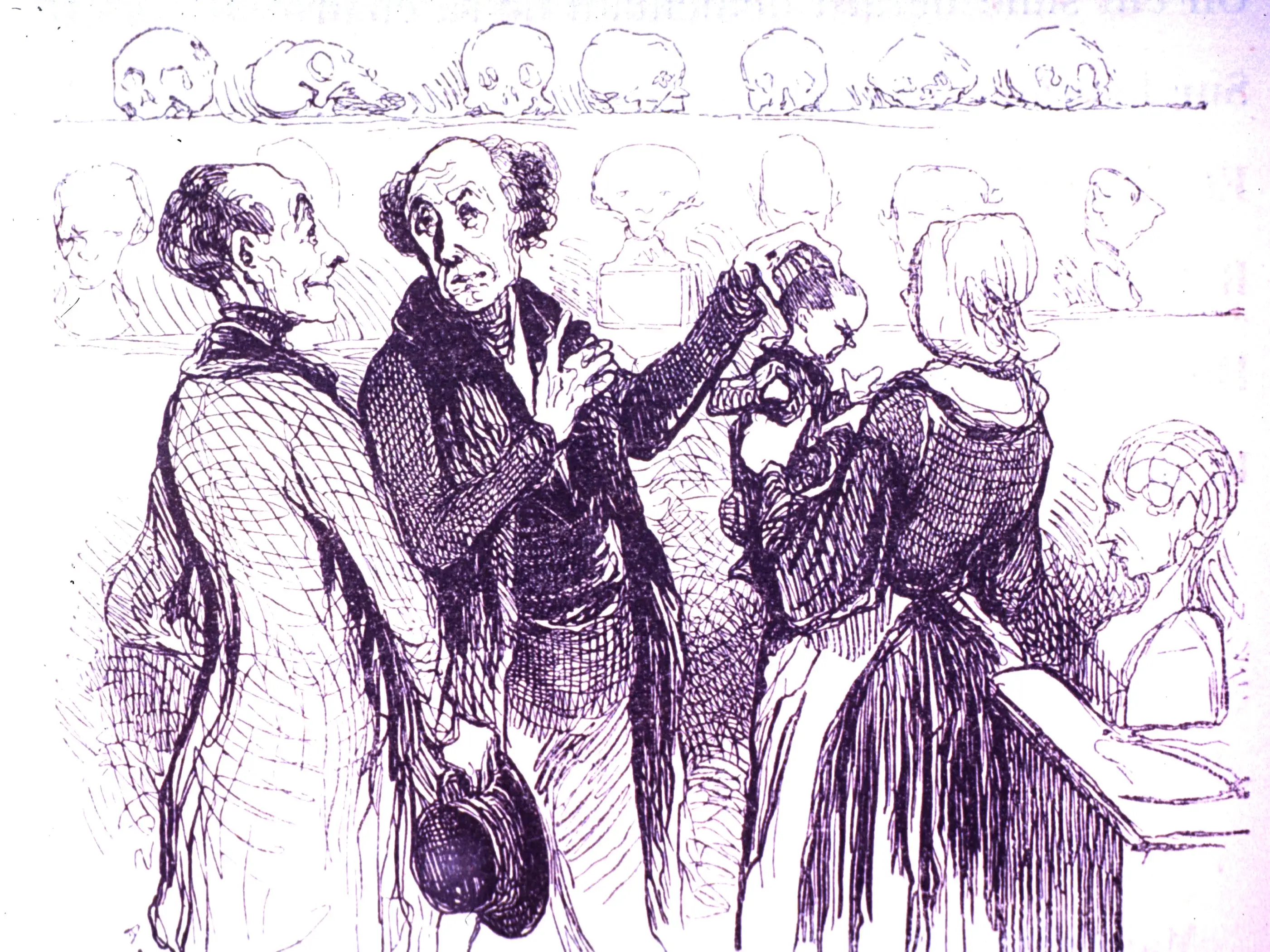 A phrenologist examines an infant.