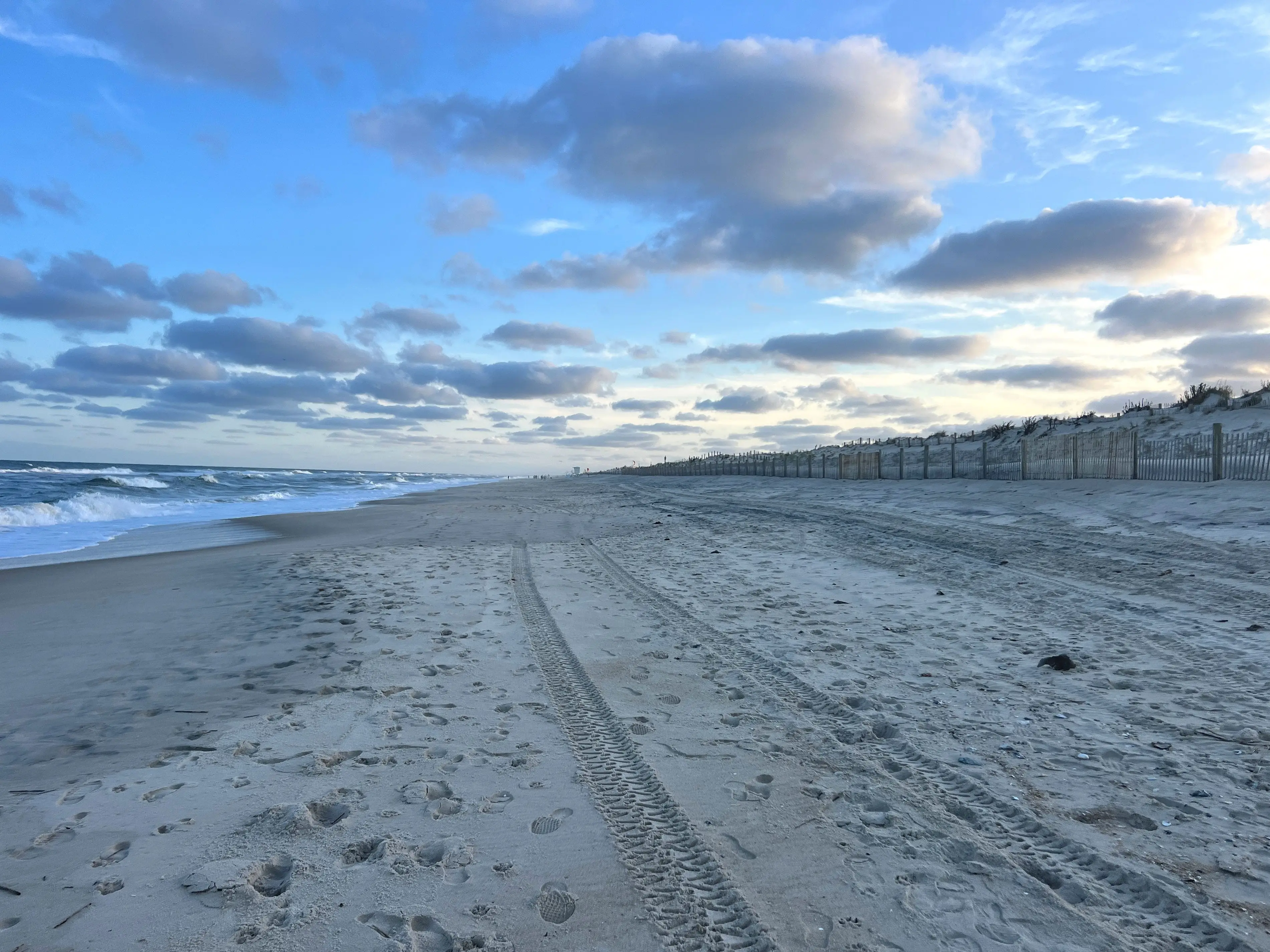 An empty beach at dusk.